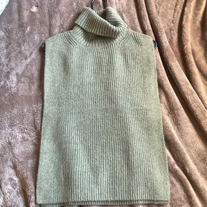 Sage green turtle neck tank style. Has open sides